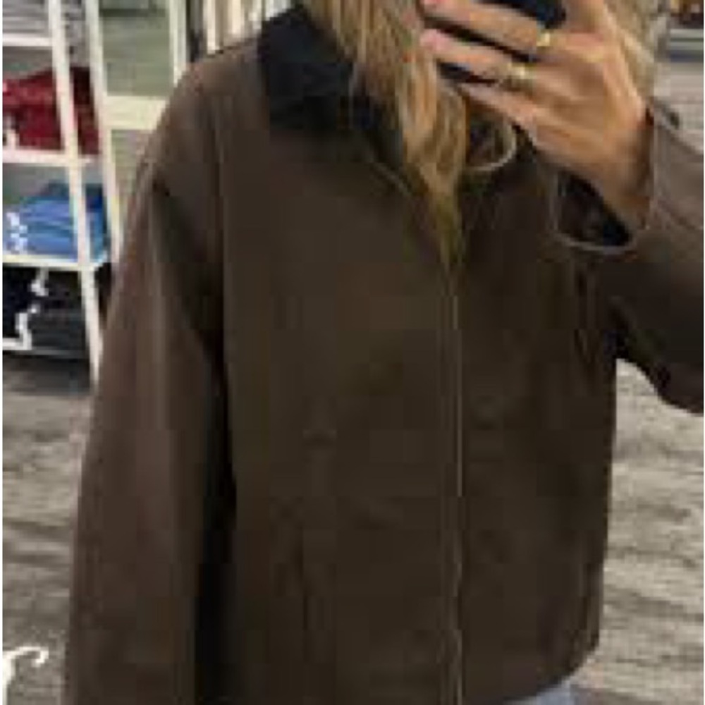 Brown barn jacket with black collar